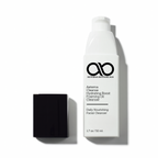 Aeterna Botanicals facial cleanser bottle with a black cleansing pad on a white background